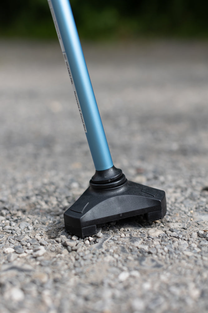 A close up of the base on a blue Hurrycane Freestanding Walking Stick