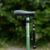 A close up of a green Hurrycane Freestanding Walking Stick
