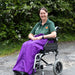 Carol from ability superstore with a purple wheelchair apron