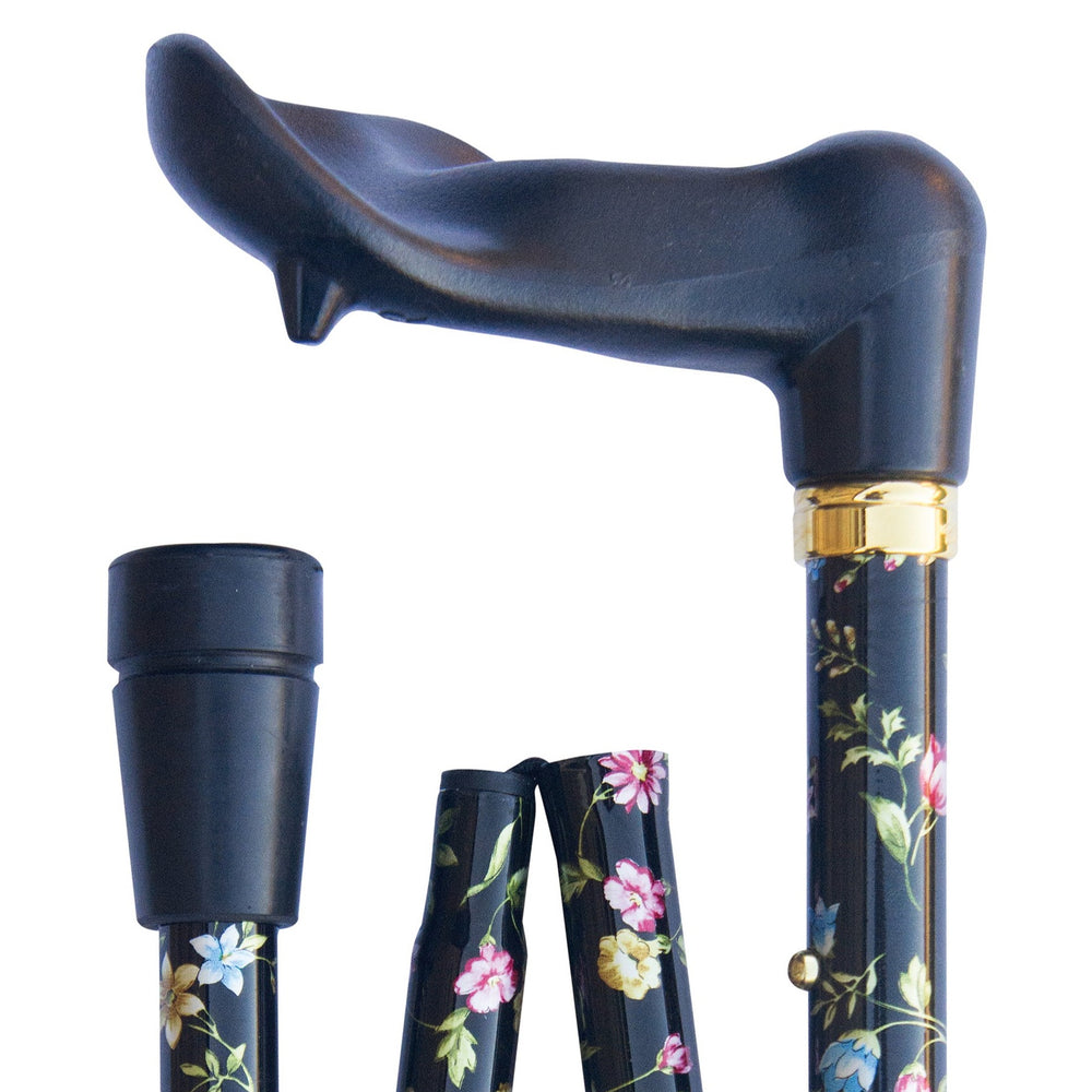 the image shows the folding orthopaedic cane in black floral