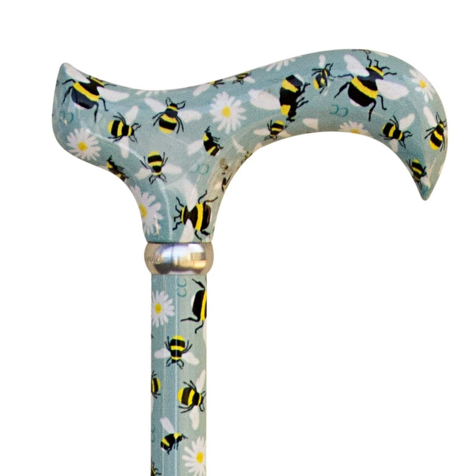 the image shows a close up of the bee design on the classic derby cane