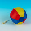 the image shows the volleyball inflation device next to an inflated volleyball