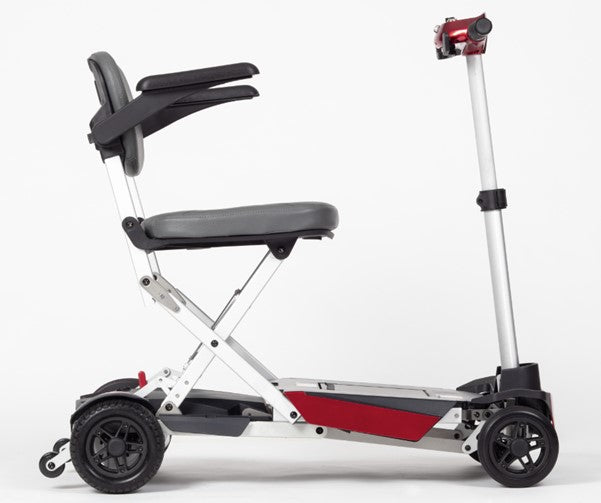 A side view of the red Manual Fold+ Scooter