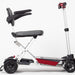 A side view of the red Manual Fold+ Scooter