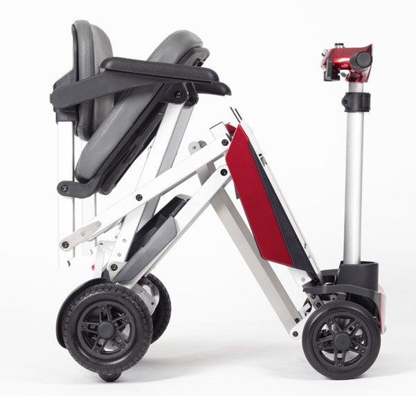 A side view of the red Manual Fold+ Scooter partially folded up
