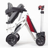 A side view of the red Manual Fold+ Scooter partially folded up