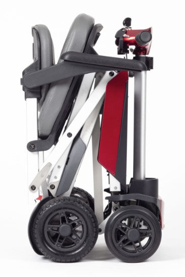 A side view of the red Manual Fold+ Scooter fullly folded up