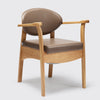 the image shows the mole coloured oak commode chair