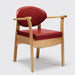 the image shows the delta red coloured oak commode chair