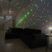 Laser Sky Projector in use, laser effect covering entire room