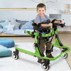 A happy child using the green Moxie Gait Trainer