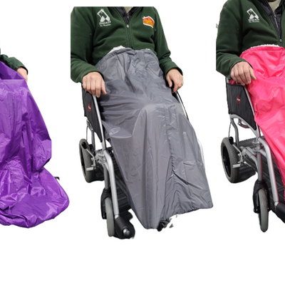 The three colours of the wheelchair apron, purple, grey, and pink