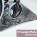 A close up of the wheel on a wheelchair going over an Aluminiu, Threshold Bridging Ramp
