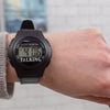 The digital style watch being worn by someone