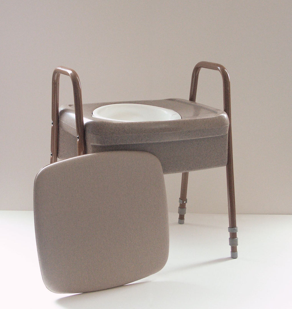 the image shows the ashby height adjustable commode with the seat cover placed to one side