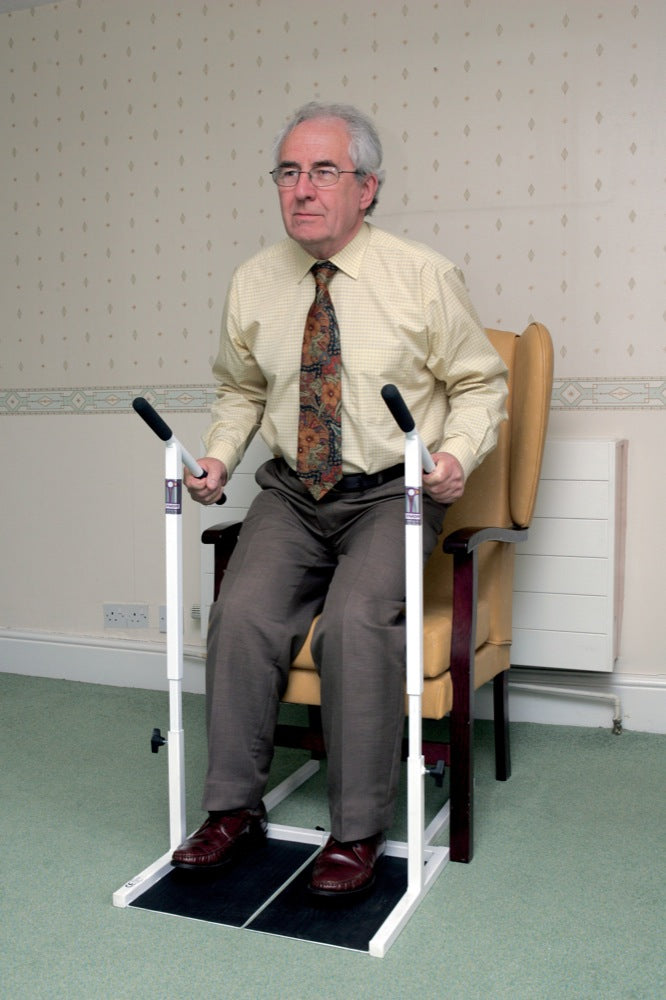 a man using the stand easy chair riser