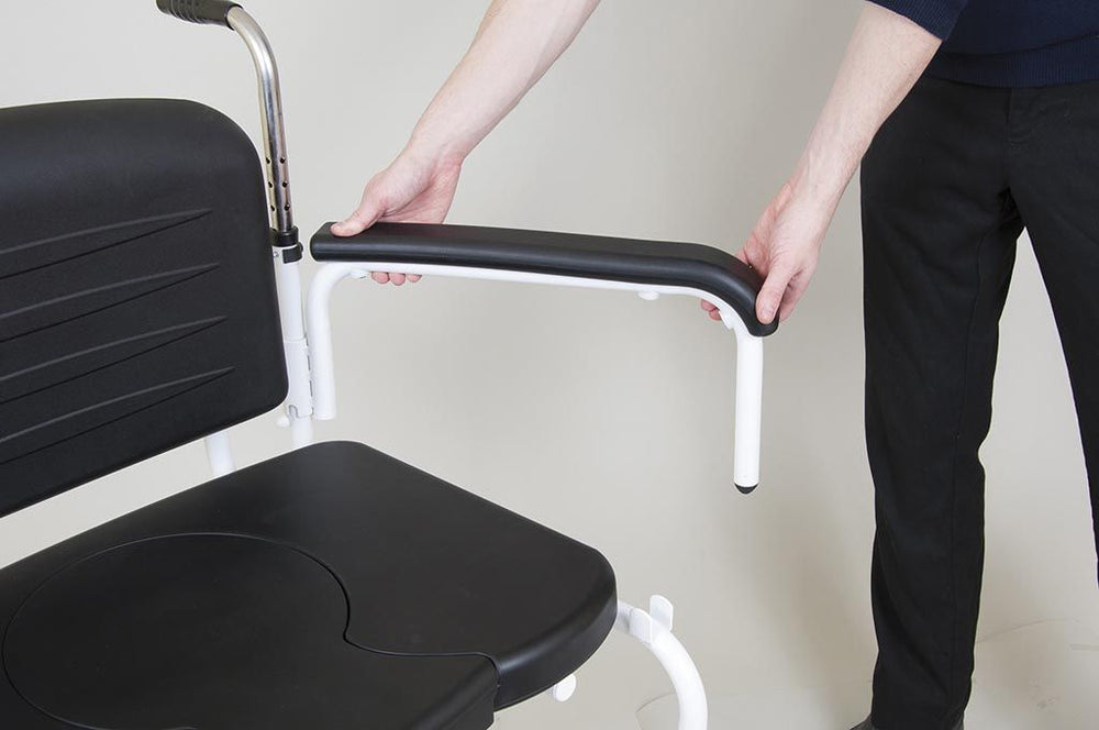the image shows the armrest on a bariatric mobile commode being adjusted