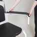 the image shows the armrest on a bariatric mobile commode being adjusted