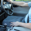 Someone using the Lifemax Far Infrared Heated Lap Blanket in a car