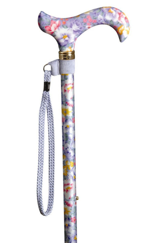 shows a walking stick strap attached to a floral patterned cane