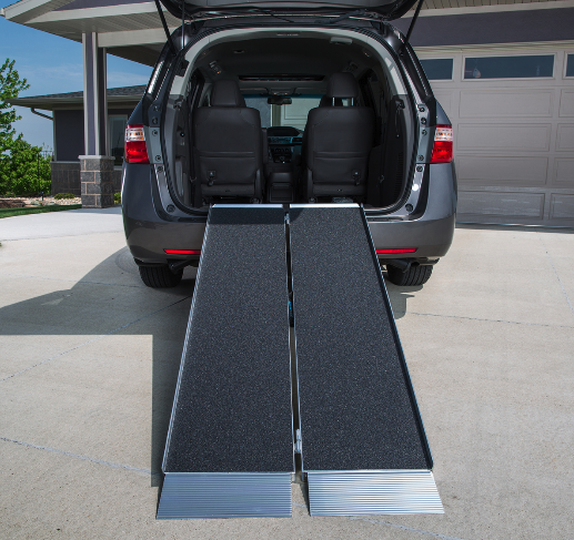 the image shows the advantage suitcase ramp being used on a car boot