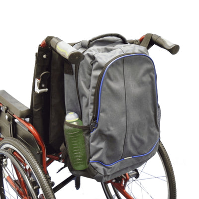 shows the mobility rucksack with pockets attached to the back of a wheelchair