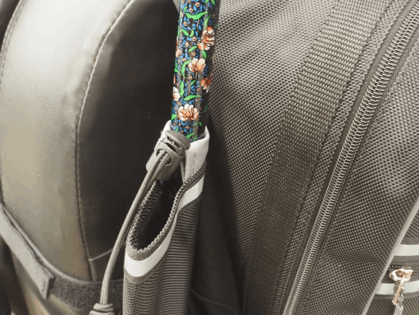 shows a close-up of the cane/crutch/stick holder compartment on the flexi mobility bag