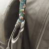 shows a close-up of the cane/crutch/stick holder compartment on the flexi mobility bag