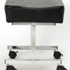 shows a side view of the adjustable height footstool