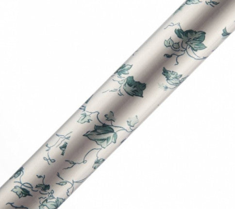 shows a close up of the ivy pattern on the folding adjustable arthritis grip cane