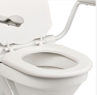 the image shows the large opening of the seat on the etac supporter toilet seat with fixed arms