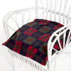 shows the red and green checked patterned harley nodular ring cushion on a chair