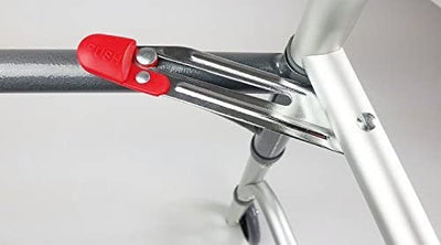 the image shows the button to push to fold or open the folding zimmer frame with wheels