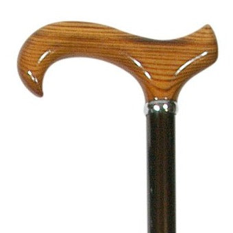 the image shows a close up of the wooden handle on the classic canes gents shock absorber cane