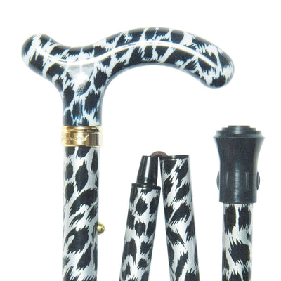 the image shows the slimline folding petite classic cane with the snow leopard design