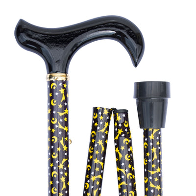shows the classic canes slimline folding derby cane in moon and stars design