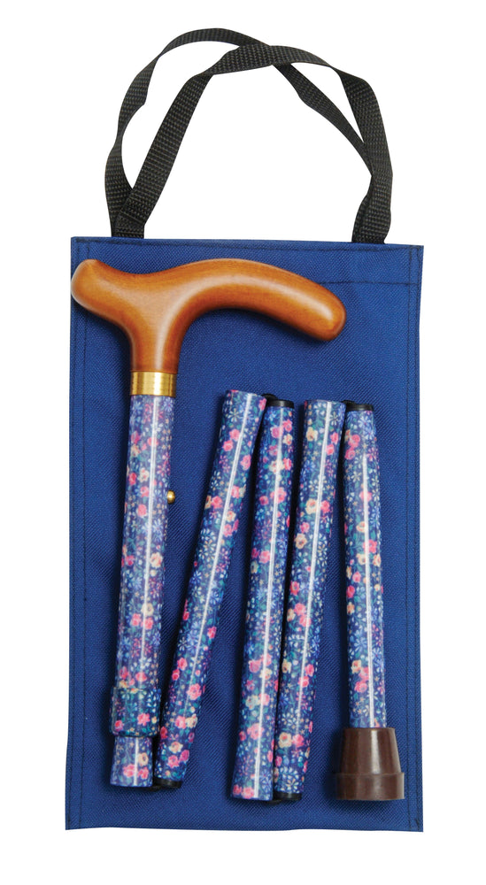 shows the Classic Canes Slimline Folding Handbag Cane in Navy Sprigged Floral with matching carry bag