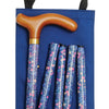 shows the Classic Canes Slimline Folding Handbag Cane in Navy Sprigged Floral with matching carry bag