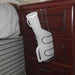 shows the Stainless Steel Urinal Bottle Holder hanging from a bedside cabinet 