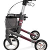 the image shows a side view of the red topro olympos rollator