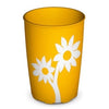 The yellow Ornamin Non-Slip Drinking Cup with a design of two white flowers on it