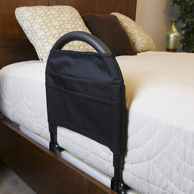 shows the bed rail advantage traveller attached to a bed