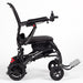the image shows a side view of the airfold powerchair in black