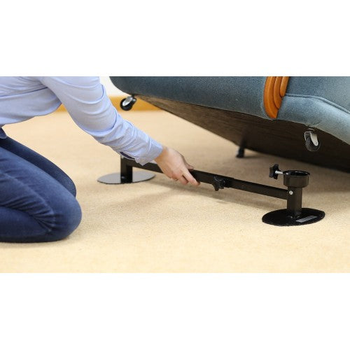 The Alexander Universal Furniture Raiser Mk2 Round Cup (6cm Diameter) being installed