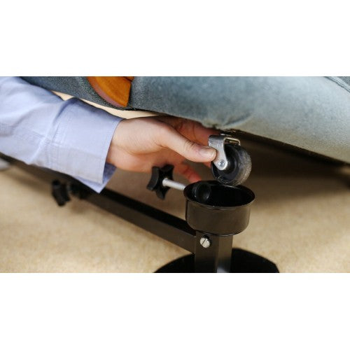 The Alexander Universal Furniture Raiser Mk2 Round Cup (6cm Diameter) being installed