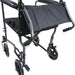 A rear view of the black Steel Compact Transport Wheelchair