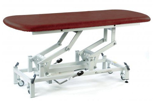 the image shows the burgundy coloured therapy hygiene table