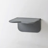 A grey etac relax shower seat without the arms attached