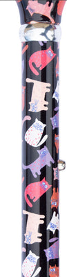 the image shows a close up of the crazy cats pattern; red, white and purple cartoon cats on a black background