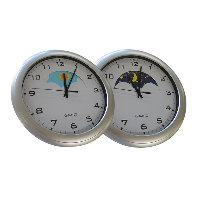 The two Dementia and Alxheimer's Care Clocks, one for daytime, and one for night.